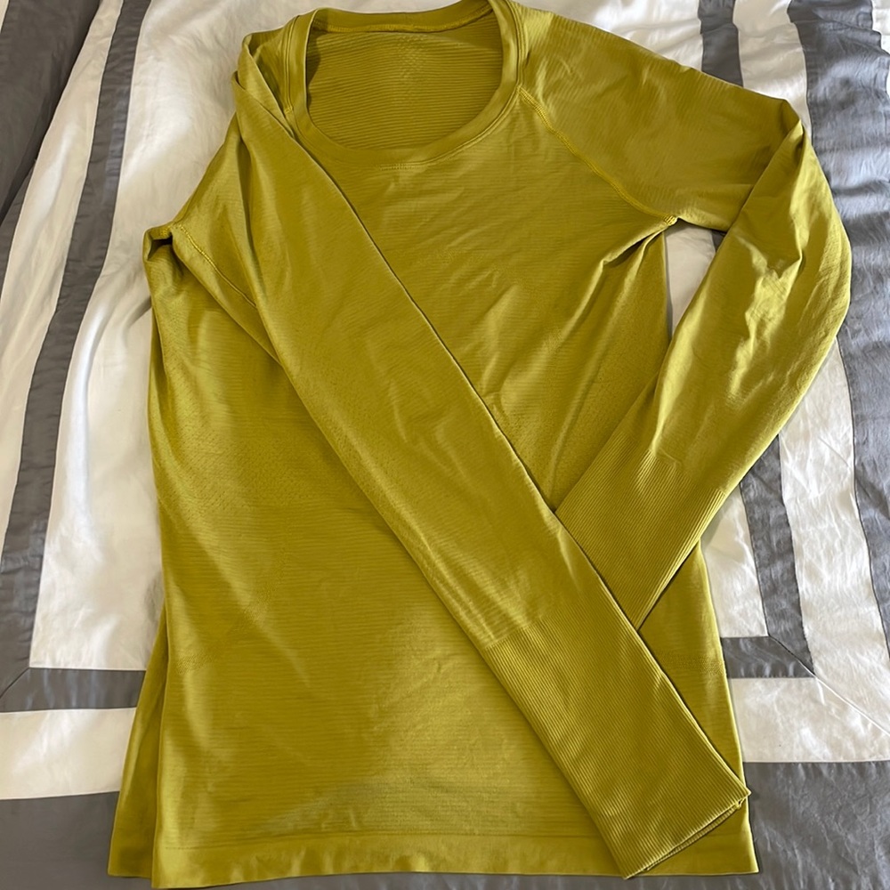 Yellowish - greenish lululemon swiftly tech shirt. Perfect condition .